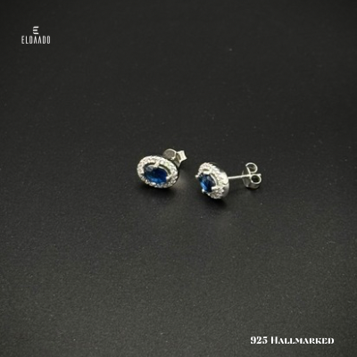 Shine bright with pure 925 Italian Silver & dazzling blue zircon studs.
